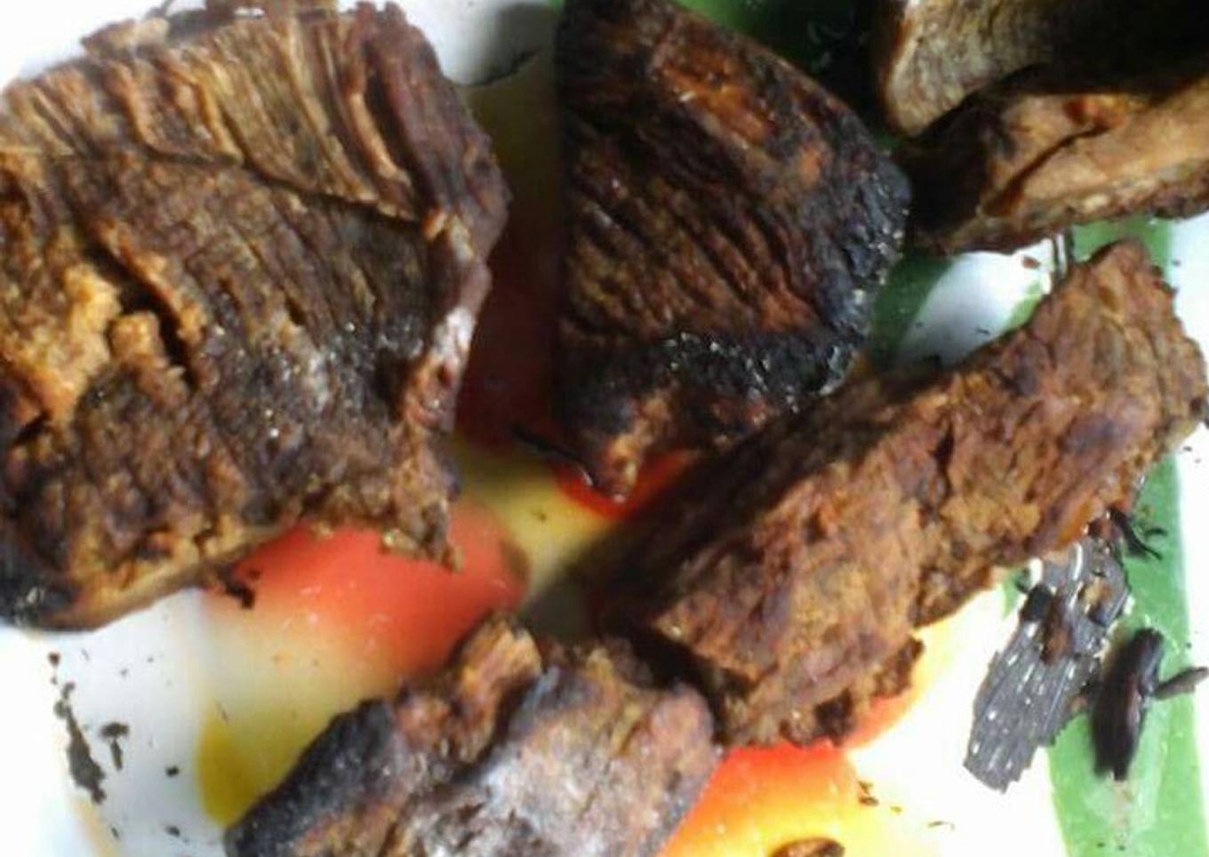 Traditional way of roasting beef and making its stew
