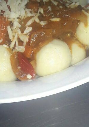 Una foto de Ñoquis rellenos con estofado criollo