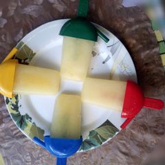 A picture of Pineapple Popsicles.