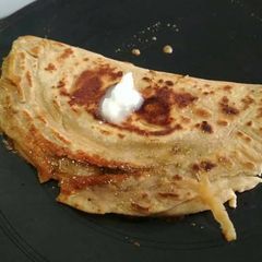 A picture of # Jaggery stuffed paratha.