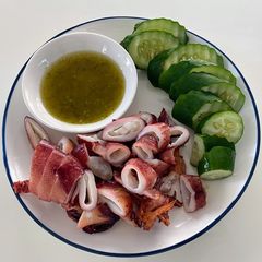 A picture of Grilled Squid with Seafood dipping sauce.