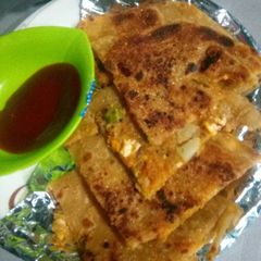 A picture of Matar paneer paratha.