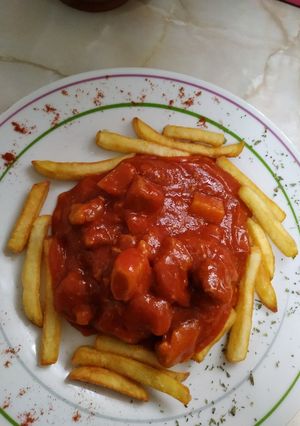 Foto principal de Magro de cerdo con tomate y patatas