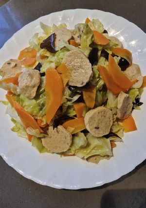 A picture of Sauteed Cabbage with Fish Balls.