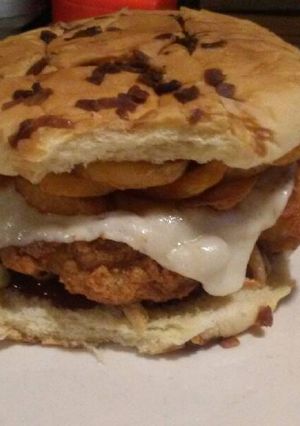 A picture of Bbq fried chicken curly fry sandwich.