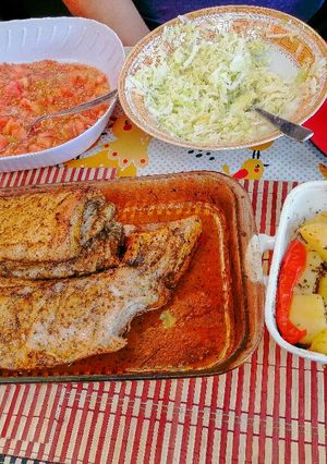 Una foto de Costillar al horno con papitas