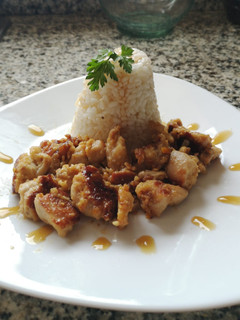 Una foto de Pollo con naranja y salsa Teriyaki