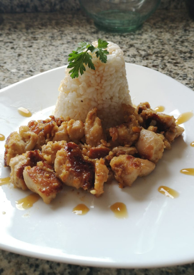 Una foto de Pollo con naranja y salsa Teriyaki
