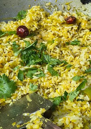 A picture of Rice is Nice Mango and Amla Rice with side dish vegetable Avial.