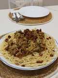 Spaghetti con Berenjena asada, Guanciale Tostato y sus jugos