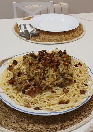Una foto de Spaghetti con Berenjena asada, Guanciale Tostato y sus jugos