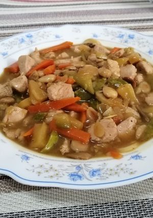 Una foto de Solomillo de pavo con almendras, estilo chino