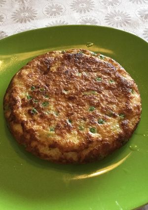 Una foto de Tortilla de arvejitas y quínoa