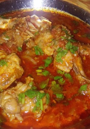 A picture of Kathiyavadi chicken curry.