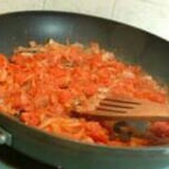 A picture of Scrambled egg with tomatoes.