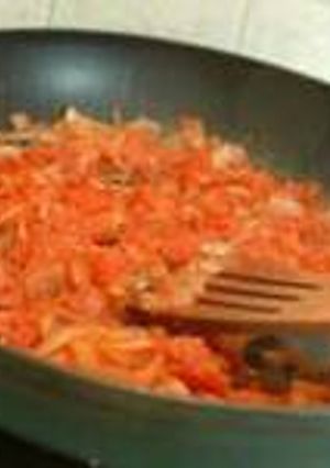 A picture of Scrambled egg with tomatoes.