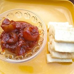 A picture of Fried yam and palm oil sauce.
