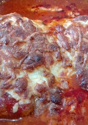 Una foto de Berenjenas con atún y tomate al horno