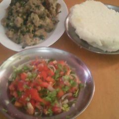 A picture of Kachumbari ugali with meat.