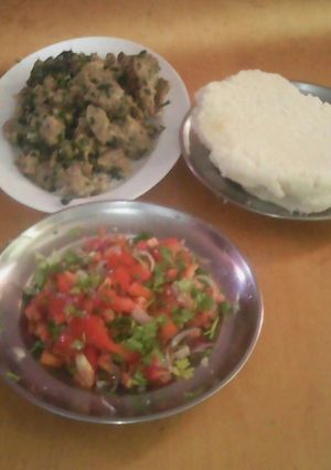 A picture of Kachumbari ugali with meat.