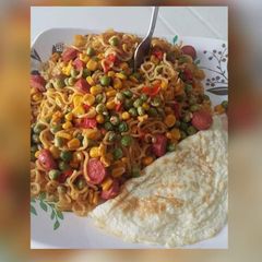 Indomine with sausage,fried egg A picture of Indomine with sausage,fried egg.