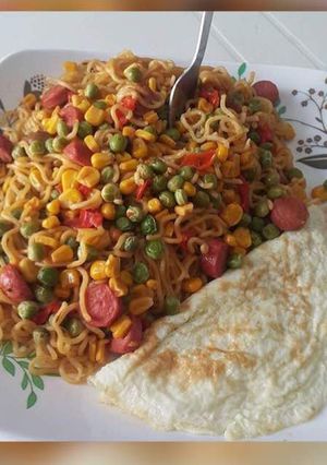 A picture of Indomine with sausage,fried egg.