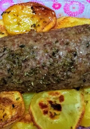 Una foto de Pan de carne arrollado con jamón y queso