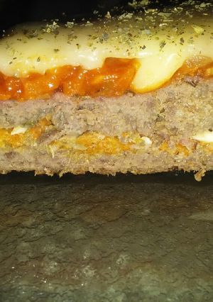 Una foto de Pan de Carne relleno a la Pizza