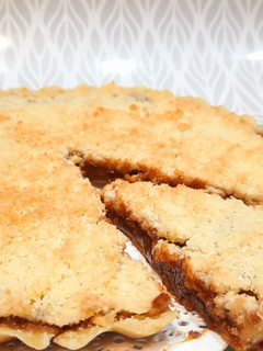 Una foto de Tarta de coco y dulce de leche🥥