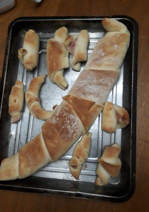 Una foto de Pan de jamón y queso