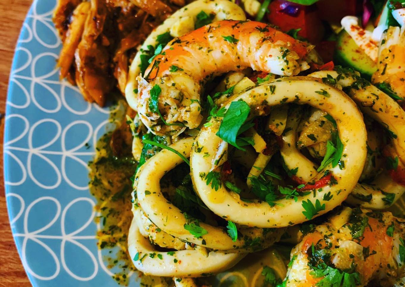Chili calamari and shrimp with garlic, lime and coriander
