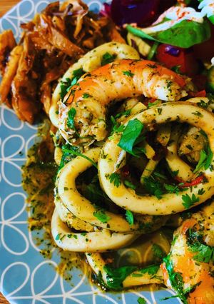 A picture of Calamari & King Prawns in Chilli Garlic Lime & Coriander.