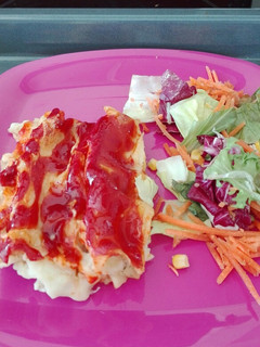 Una foto de Canelones de merluza y gambas