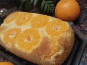 Una foto de budin de mandarina con manteca