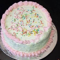 A picture of Lemon cake with butter icing.