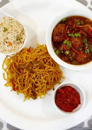 A picture of Chowmin veg manchurian and fried rice.