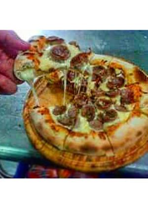 Una foto de Pizza