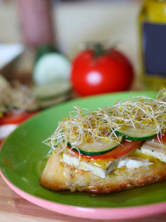 A picture of Tofu and salad on toast.