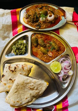 A picture of Stuffed Tondali peanuts masala with jowar bhakri and spicy thecha, in dinner.