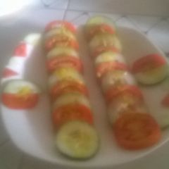 Tomato and cucumber salad A picture of Tomato and cucumber salad.