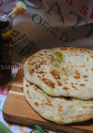 A picture of Potato Stuffed Bread (Naan Shekampur).