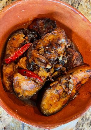 A picture of Caramelized Catfish in Clay Pot with Tea Infusion.