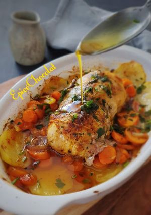 Une photo de Rôti de poulet et pommes de terre carottes