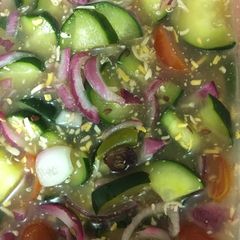 A picture of Marinated Cucumber Red Onion Salad.