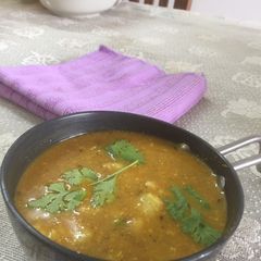 A picture of Boiled arbi(colocasia) in curd gravy.