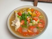 A picture of chicken leg with potatoes