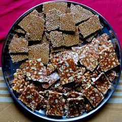 A picture of Sesame seeds and peanuts chikki.