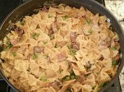 A picture of carbonara with peas