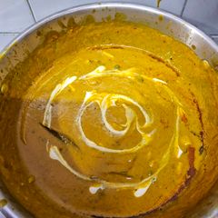 A picture of Yellow Malai Paneer.
