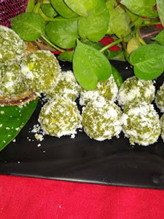 A picture of Betel leaf dates coconut ladoo.